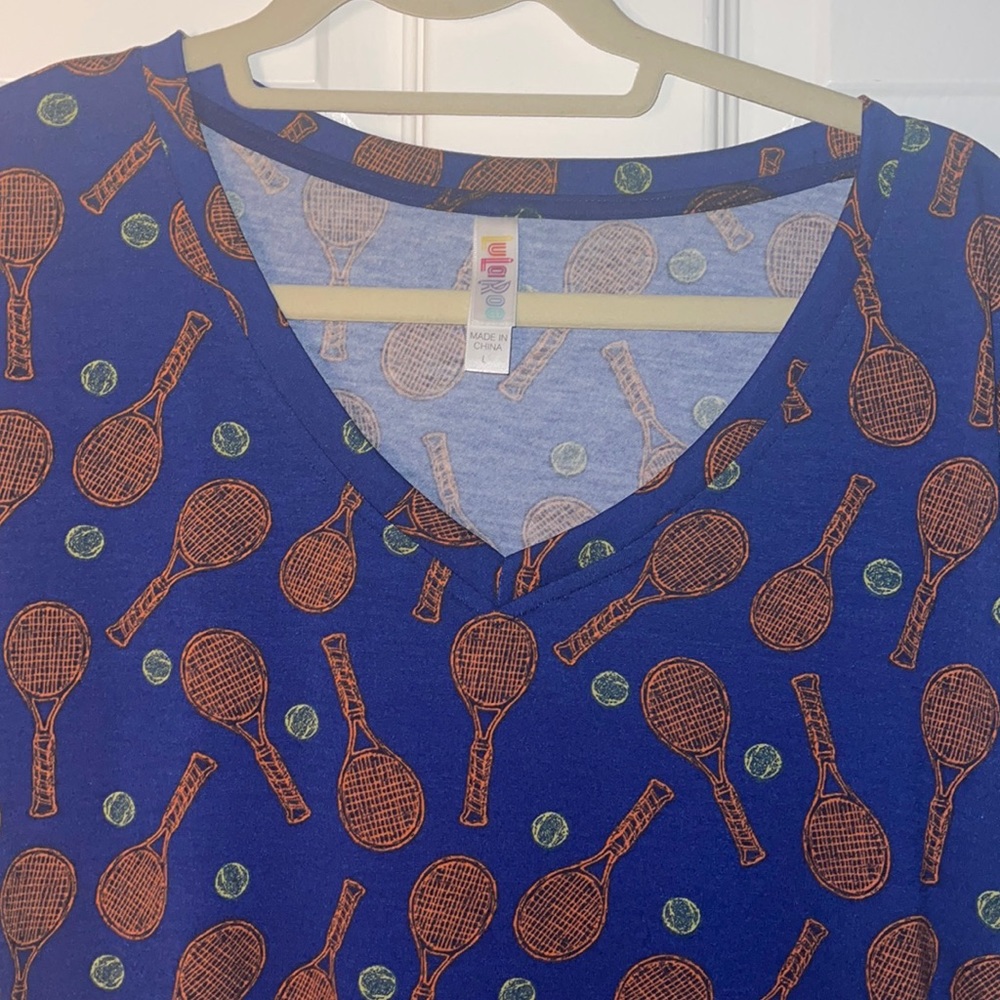 Christy Tee, with tennis rackets. Brand new. With Tags.